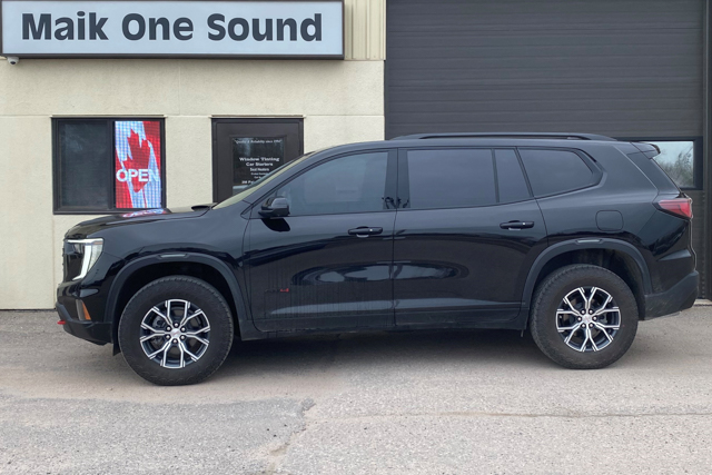 2025 GMC Acadia with professional window tint in North Bay